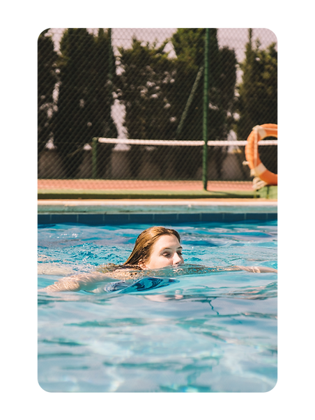 A swimmer in an outdoor pool