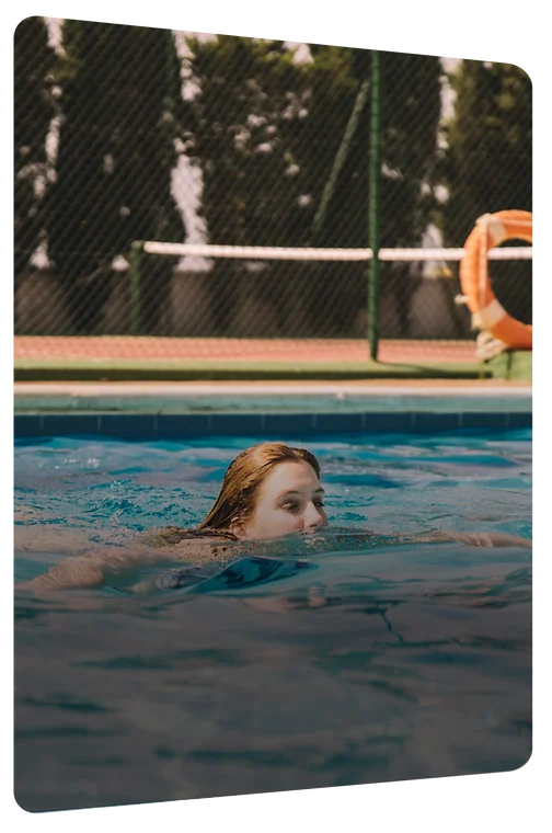 A swimmer in an outdoor pool