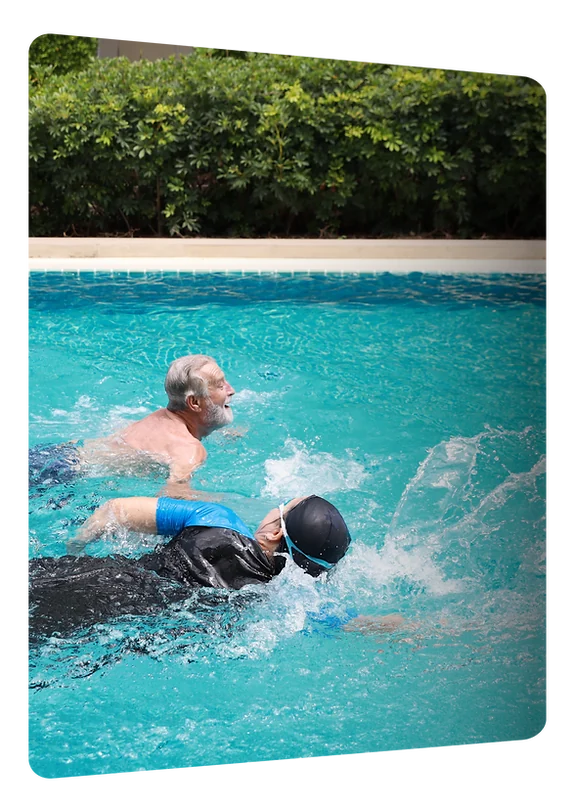 Swimmers of different ages in a pool
