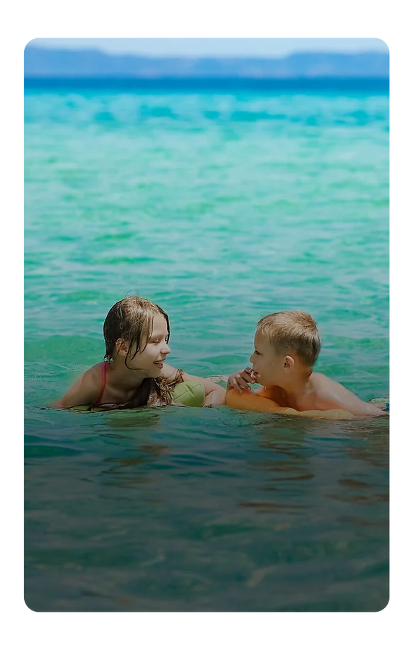Children swimming in the sea